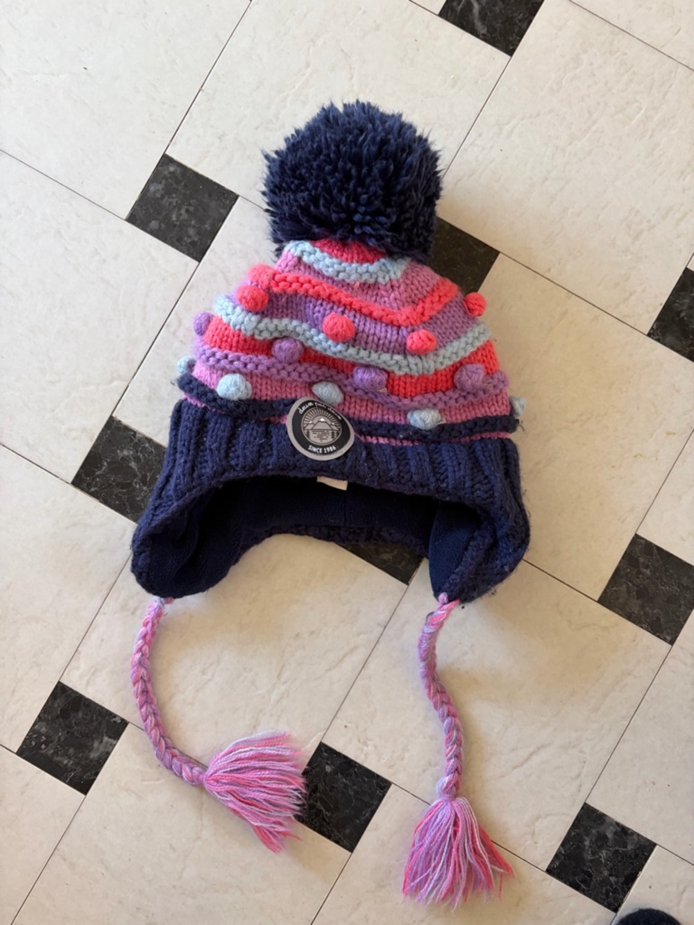 Children's Navy Earflap Hat with Pink & Light Blue Pom Details
